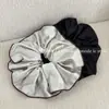 Scrunchie de Tela Texturizada Plisada Overlock Estilo Coreano Elegante Versátil Cuerda para el Cabello Cola de Caballo Simple para Mujeres