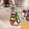 Llavero de elfo recogiendo flores de dibujos animados creativo muñeca de niña linda colgante para mochila de estudiante pequeño regalo al por mayor