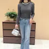 Camisa de Base Elegante Slim com Gola Redonda para Mulheres Outono e Inverno 2026 Nova Malha de Alto Padrão com Top de Malha de Manga Longa
