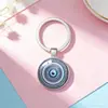 Llavero con colgante de ojo de Horus transfronterizo, bolsa de regalo para amantes religiosos, mal de ojo, mal de ojo