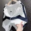 Nueva colección de verano: Pantalones cortos casuales de retazos estilo americano para hombre, modernos, de corte holgado, versátiles, transpirables, de secado rápido, de pierna recta y de longitud de cinco puntos, tipo atlético