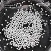 Joyería para uñas popular en línea japonesa al por mayor versátil redonda tridimensional perla brillante diy accesorios mixtos para uñas