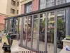 Puerta plegable Puerta divisoria Puerta de garaje Tienda de coches Tienda Puerta corrediza Ruptura térmica Aleación de aluminio Puerta plegable corrediza de alta resistencia Vidrio