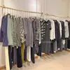 Estante de exhibición para sucursal de tienda de ropa, perchero de pared para ventana simple, barra para colgar ropa en el techo, tendedero, perchero de cuerda de cáñamo