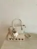 Elegante bolsa de palha trançada para mulheres, nova moda outono 2026, bolsa pequena versátil para o dia a dia, para usar na transversal
