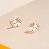 Pendientes Exquisitos de Plata Pura S999 con Forma de Trébol de Cuatro Hojas para Mujer, Diseño de Nicho de Lujo Ligero, Sensación de Alta Gama, Pendientes de Plata con Cierre de Mariposa en Forma de Corazón al por Mayor