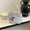 Bolso de cesta versátil para mujer estilo coreano, bolso de mano de estilo nicho, bolso pequeño nuevo 2026, bolso cubo de moda para mujer