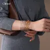 Pulsera Redonda Entrelazada Hueca Transfronteriza Europea y Americana, Pulsera de Declaración Moderna y Única, Joyería de Lujo Ligero de Gama Alta para Mujeres