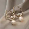 Pendientes Vintage Estilo Francés con Ojo de Gato Incrustado de Diamantes y Perlas, Pendientes de Lujo Ligero de Gama Alta, Exquisitos y Modernos Accesorios para Orejas Versátiles al por Mayor