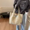 Bolso de Hombro Minimalista Estilo Japonés de Gran Capacidad 2026 Modelo Nuevo Bolso Tote Artístico Versátil para Estudiantes Universitarios que Asisten a Clases Bolso Tote para Mujer