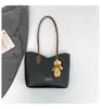Bolso de mano de moda de nicho transfronterizo para mujer, nuevo modelo de verano 2026, bolso de hombro color block, bolso de axila para el trabajo