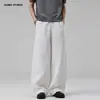 Calça Casual de Piercing Americano Jiamu Retro Vintage de Perna Larga para Homens e Mulheres, Estilo Solto Reto Baggy Unissex Drapeado