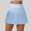 Nueva falda plisada de tenis de cintura alta para otoño e invierno para mujer, minifalda deportiva de bádminton con bolsillos, falda falsa de dos piezas anti-exposición