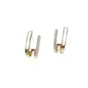 Pendientes más vendidos transfronterizos de Yanbo, pendientes de botón verticales de circonita cúbica, lujo ligero para mujer, de alta gama, sencillos, versátiles, venta directa de fábrica