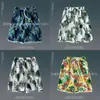 Bermudas de Playa para Hombre Vacaciones Junto al Mar Secado Rápido Sueltas Delgadas de Cinco Puntos Shorts para Hombre Deportivos Casuales Pantalones Florales Venta al por Mayor