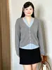Top estiloso de malha para tamanhos grandes, com blocos de cor, estilo duas peças, gola halter, outono 2026, tricô casual modelador para mulheres plus size