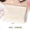 Bolsa de Armazenamento com Fecho de Botão de Pressão Automático em Couro PU Portátil para Batom Fones de Ouvido Joias Miudezas Bolsa de Mão Pequena de Tecido Venda por Atacado