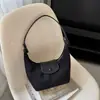 Bolso tipo dumpling con estampado de leopardo de moda transfronterizo, nuevo modelo de otoño 2026, bolso de hombro y bandolera exquisito de alta gama y elegante para mujer