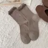 Calcetines nuevos de otoño estilo coreano blanco y negro lunares ballet calcetines de media pantorrilla para mujer Lolita dulce lazo calcetines apilados