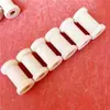 Venta al por mayor de fábrica artesanías de madera carrete de loto 16*27MM carrete de madera accesorios para joyería DIY