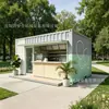 Tienda prefabricada tipo contenedor de estilo graffiti minimalista con plataforma de ocio exterior, tienda de postres ensamblable para zonas escénicas y uso en la calle