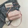 Bolsa Xiaofang Cat 2026 Macia Fofa Outono Nova de Ombro Único Color Block Fofa Versátil Desenho Animado para Mulheres, Bolsa Transversal de Nicho
