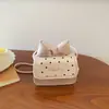Bolso cuadrado pequeño de diseño de nicho con lunares estilo coreano transfronterizo, nuevo de verano 2026 moda para mujer bolso bandolera simple y elegante