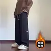 Pantalones de dos piezas falsos para hombre, moda de primavera y otoño, marca, pantalones deportivos de pierna ancha, nuevo 2024, pantalones casuales gruesos con forro polar para otoño e invierno