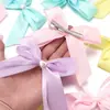 Nuevo Pasador de Pelo con Lazo de Perla Accesorios para el Cabello Clip Lateral Tocado Muñeca Macaron Infantil Accesorios para Ropa
