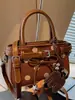 Bolsa retrô fashion de bolinhas de nicho 2026 nova bolsa transversal casual feminina bolsa de mão estilosa, requintada e única