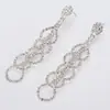 Brincos de argola redondos com franjas longas da moda europeia e americana Joias de brinco grandes e sexy para boate europeia e americana atacado E398