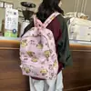 Transfronterizo 2024 nueva mochila diaria graffiti lindo dibujos animados animación estudiantes de primaria y secundaria bolsa de hombro de gran capacidad venta al por mayor