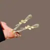 Pinza para el Cabello para Mujer 2026 Modelo Nuevo de Alta Gama Lujo Ojo de Gato Lazo Pinza Lateral Flequillo Pasador Accesorio para el Cabello Pasador