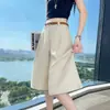 Foto real de los nuevos pantalones cortos finos de lino Tencel de verano 2026, pantalones de pierna ancha, pantalones de seda helada de cintura alta, pantalones de mujer hasta la rodilla