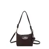 Bolso de gamuza de otoño para mujer 2026 nuevo súper popular moda versátil bolso tipo dumpling casual retro versátil bolso cruzado