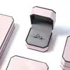 Caja de joyería octagonal de cuero de alta gama con bordes negros para anillos, collares, pulseras, pendientes y tachuelas, caja de almacenamiento portátil