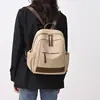 Mochila de nailon moderna y a la moda, mochila versátil para viajes transfronterizos, bolso casual para mujer, nuevo bolso para mujer 2025 al por mayor