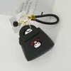 Colgante Creativo de Macarrón Regalo Cuerda Trenzada a Mano Bolsa para Llaves Dibujo Animado Sanrio Color Caramelo Billetera Pequeña al por Mayor