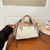 Bolsa de Lona Nueva Otoño 2026 Moda para Viajes Bolso de Mano Simple Moderno Toque de Lujo Bolso de Hombro Único para Mujer