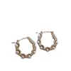 Pendientes de Perla Circulares de Diseño de Nicho de Lujo Ligero Coreano para Mujer, Nuevos Clips de Oreja Retro Personalizados
