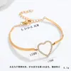 Pulsera de Trébol de Cuatro Hojas Chapada en Oro de 18 Quilates de Acero de Titanio, Simple, Nicho, Elegante, Pulsera de Alta Gama, Elegante, Lujo Accesible y Joyería Personalizada