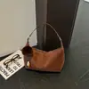 Bolsa transversal de bolinho retrô nova versátil bolsa tote grande capacidade nova de ombro único novo produto para o trabalho francês