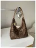 Bolsa de leopardo de nicho transfronteiriça super quente para mulheres 2026 nova bolsa casual para o dia a dia bolsa tote de ombro único grande capacidade moderna