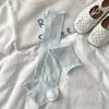 Meias femininas de primavera e verão com estampas florais geométricas, meias até a panturrilha combinadas com sapatos de couro pequenos, polainas sem pé versáteis