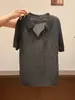 Top de Malha Verão 2026 Estilo College com Recortes Trançados, Gola Polo de Manga Curta para Mulheres, Camisa de Nicho de Alta Qualidade com Caimento Solto