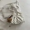 Bolso de lunares 2026 nuevo otoño e invierno gamuza felpa moderno bandolera de axila tacto de alta gama para ir al trabajo bandolera única retro bolsa esmerilada