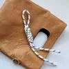 Celebridad de Internet Colgante Tejido Accesorios DIY Miu Semicabado Nudo Chino Cuerda Trenzada Correa para Teléfono Colgante de Bolso Decoración Creativa Hecha a Mano