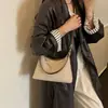 Bolso de hombro de gamuza versátil de gran capacidad, modelo nuevo 2026, bolso de cadena vintage para mujer, bolso cruzado para la ciudad