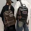 Mochila de viaje versátil de gran capacidad, estilo casual, nueva, para hombres y mujeres, con bolsillos, adecuada para ir al trabajo, mochila funcional 2026
