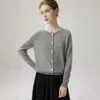 Cachemira rara y exquisita: un cárdigan de punto 100% cachemira pura, suave y cómodo para mujer, con un pequeño estampado de lunares y un diseño calado.